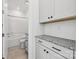 Clean bathroom with a shower/tub combo, granite vanity, and tile flooring at 148 Windy Dell Dr, Tega Cay, SC 29708