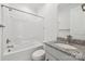 Simple bathroom with a shower/tub combo, granite vanity, and tile flooring at 148 Windy Dell Dr, Tega Cay, SC 29708