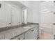 Bathroom with granite countertop, single sink, and shower/tub combo at 148 Windy Dell Dr, Tega Cay, SC 29708