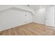 Bright bonus room with wood-look floors and an open layout at 148 Windy Dell Dr, Tega Cay, SC 29708