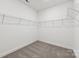 Large walk-in closet with wire shelving for convenient storage at 148 Windy Dell Dr, Tega Cay, SC 29708