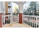 Covered patio with white gate and brick accents at 16316 Redstone Mountain Ln, Charlotte, NC 28277