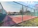 Well-maintained tennis court with chain link fence at 16316 Redstone Mountain Ln, Charlotte, NC 28277