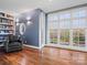 Cozy reading room with built-in shelves and large windows at 1655 Scotland Ave, Charlotte, NC 28207