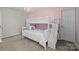 bedroom with bunk bed and pink accent wall at 3032 Sterling Ct, Indian Land, SC 29707