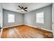 Bright bedroom with hardwood floors and ceiling fan at 3612 The Plz, Charlotte, NC 28205