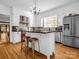 Bright kitchen with an island and stainless steel appliances at 407 N Grove St, Lincolnton, NC 28092