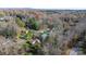 Aerial view of home in wooded neighborhood at 4142 2Nd Ne St, Hickory, NC 28601