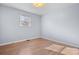 Simple bedroom with light walls and wood-look flooring at 4142 2Nd Ne St, Hickory, NC 28601