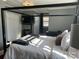 Bright bedroom with a large four-poster bed, and plenty of closet space at 415 Willow St, Gastonia, NC 28054
