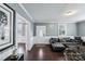 Bright entryway with hardwood floors and view into living room at 415 S Willow St, Gastonia, NC 28034