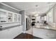 Updated kitchen with white cabinets, granite countertops and stainless steel appliances at 415 Willow St, Gastonia, NC 28054