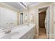 Bathroom with double vanity, large mirror, and shower at 416 Queens Rd # 11, Charlotte, NC 28207