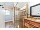 Spa-like bathroom with a large glass shower and granite vanity at 49412 Wood Land Dr, Norwood, NC 28128