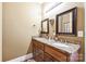 Elegant bathroom with double vanity and granite countertops at 49412 Wood Land Dr, Norwood, NC 28128