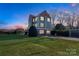 Lakefront home with a two-car garage and a large backyard at 49412 Wood Land Dr, Norwood, NC 28128