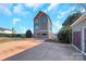 Three-story home with detached garage and ample parking at 49412 Wood Land Dr, Norwood, NC 28128