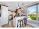 Kitchen with breakfast bar, stainless steel appliances, and view at 49412 Wood Land Dr, Norwood, NC 28128