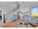 Bright and airy living room with hardwood floors and a view to the backyard at 49412 Wood Land Dr, Norwood, NC 28128