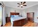 Large main bedroom with hardwood floors and private balcony access at 49412 Wood Land Dr, Norwood, NC 28128