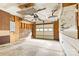 Garage with pegboard walls, ceiling fan, and workbench at 5025 Gibraltar Dr, Sherrills Ford, NC 28673