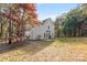 Two-story house back elevation with patio and surrounding trees at 5025 Gibraltar Dr, Sherrills Ford, NC 28673