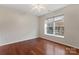 Well-lit bedroom with hardwood floors and window seat at 729 Meadow Lake Dr, Matthews, NC 28105