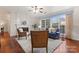 Relaxing living room with fireplace and hardwood floors at 729 Meadow Lake Dr, Matthews, NC 28105