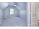 Bedroom with sloped ceilings, ceiling fan and closet at 9316 Macquarie Ln, Charlotte, NC 28227