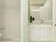 Modern bathroom with white vanity, and a large mirror at 1578 Croyden St, Indian Land, SC 29707