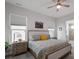 Main bedroom with king-size bed, nightstands, and ensuite bathroom access at 17134 Sand Bank Rd, Charlotte, NC 28278