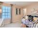 Bedroom with daybed and decorative wall art at 1808 Otter Perch Ln, Fort Mill, SC 29715