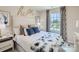 Bright bedroom with a queen-size bed, and neutral decor at 1808 Otter Perch Ln, Fort Mill, SC 29715