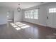 Bright living room featuring hardwood floors and large windows at 2274 Nc 109 S Hwy, Wadesboro, NC 28170