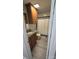 Clean bathroom with granite countertop, wood cabinets, and updated shower at 433 Pamela St, Gastonia, NC 28054