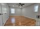 Bright bedroom with hardwood floors and ceiling fan at 433 Pamela St, Gastonia, NC 28054