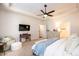 Relaxing main bedroom with TV and ensuite bathroom access at 7669 Tanglewood Way, Denver, NC 28037