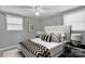 Cozy bedroom with a full-size bed and black and white bedding at 7914 Rainbow Dr, Charlotte, NC 28227