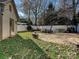 Backyard with patio, fire pit, and shed at 820 Millbrook Rd, Charlotte, NC 28211