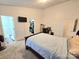 Comfortable bedroom with a large bed and closet at 8325 Fox Swamp Rd, Charlotte, NC 28215