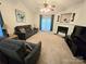 Spacious living room featuring a fireplace and comfortable seating at 8325 Fox Swamp Rd, Charlotte, NC 28215