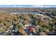 Aerial view showing house near lake and town at 901 Edgemont Ave, Belmont, NC 28012