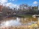 Calm lakefront view with a private dock and boat slip at 9066 Tulagi Ct, Tega Cay, SC 29708