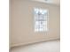 Simple bedroom with neutral walls, carpet and one window at 9823 Old Garden Cir, Gastonia, NC 28056