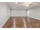 Spacious finished basement with wood flooring at 104 Vista Dr, Davidson, NC 28036