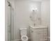 Basement bathroom with walk-in shower and round mirror at 104 Vista Dr, Davidson, NC 28036