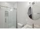 Basement bathroom with walk-in shower and storage at 104 Vista Dr, Davidson, NC 28036