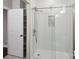 Basement bathroom with a walk-in shower and storage at 104 Vista Dr, Davidson, NC 28036