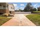 Long driveway leading to house and garage at 104 Vista Dr, Davidson, NC 28036