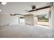 Large garage with open door and storage at 104 Vista Dr, Davidson, NC 28036